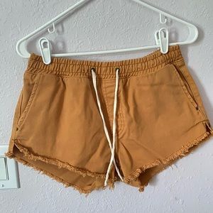 Mustard yellow Billabong jean shorts